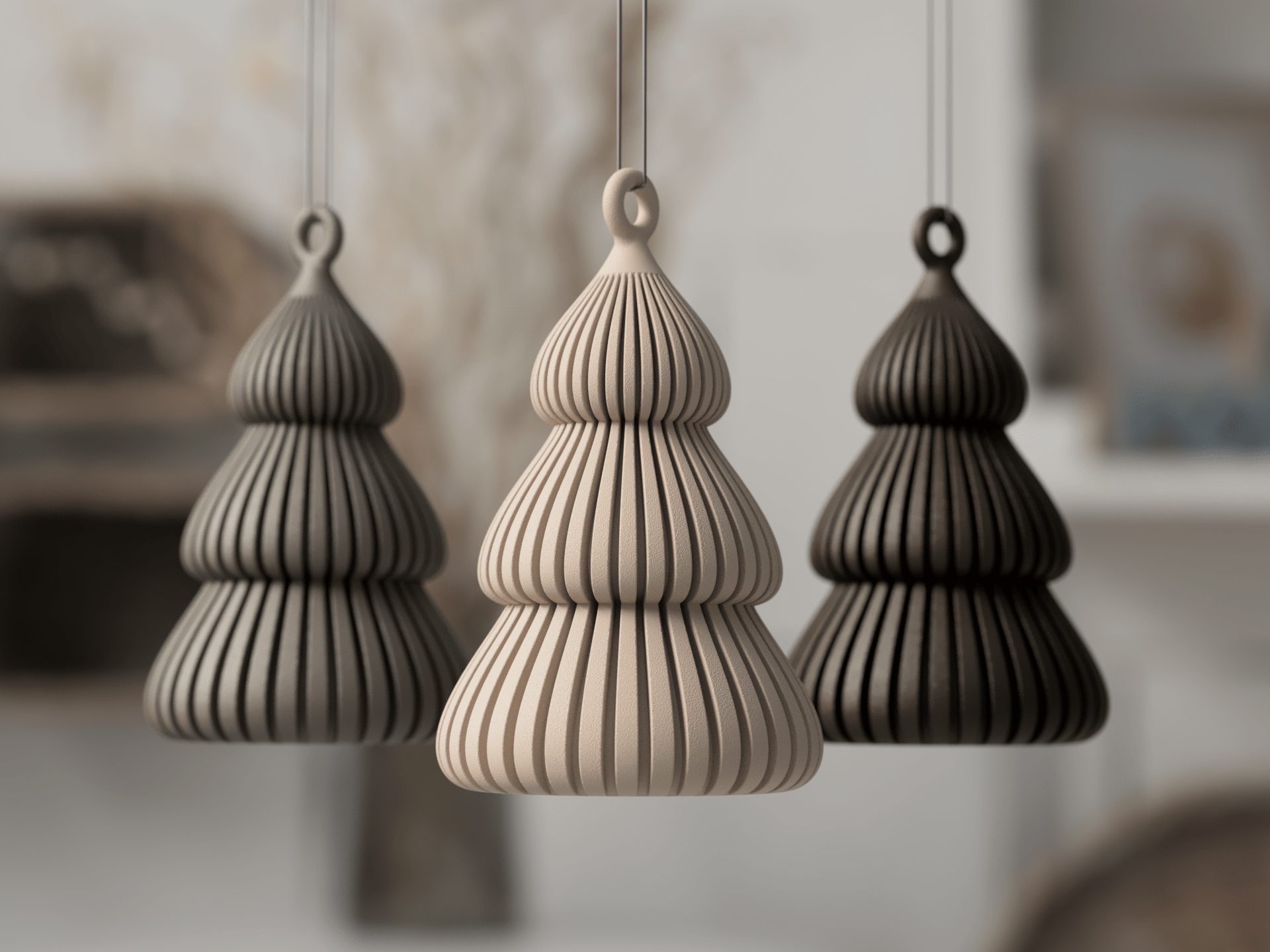 Tre hængende 3D-printede juletræspynt i beige og grå – ribbede minimalistiske juledekorationer i skandinavisk design