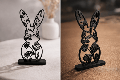 Nærbillede af sort påskehare skulptur med blomsterudskæringer – minimalistisk påskepynt