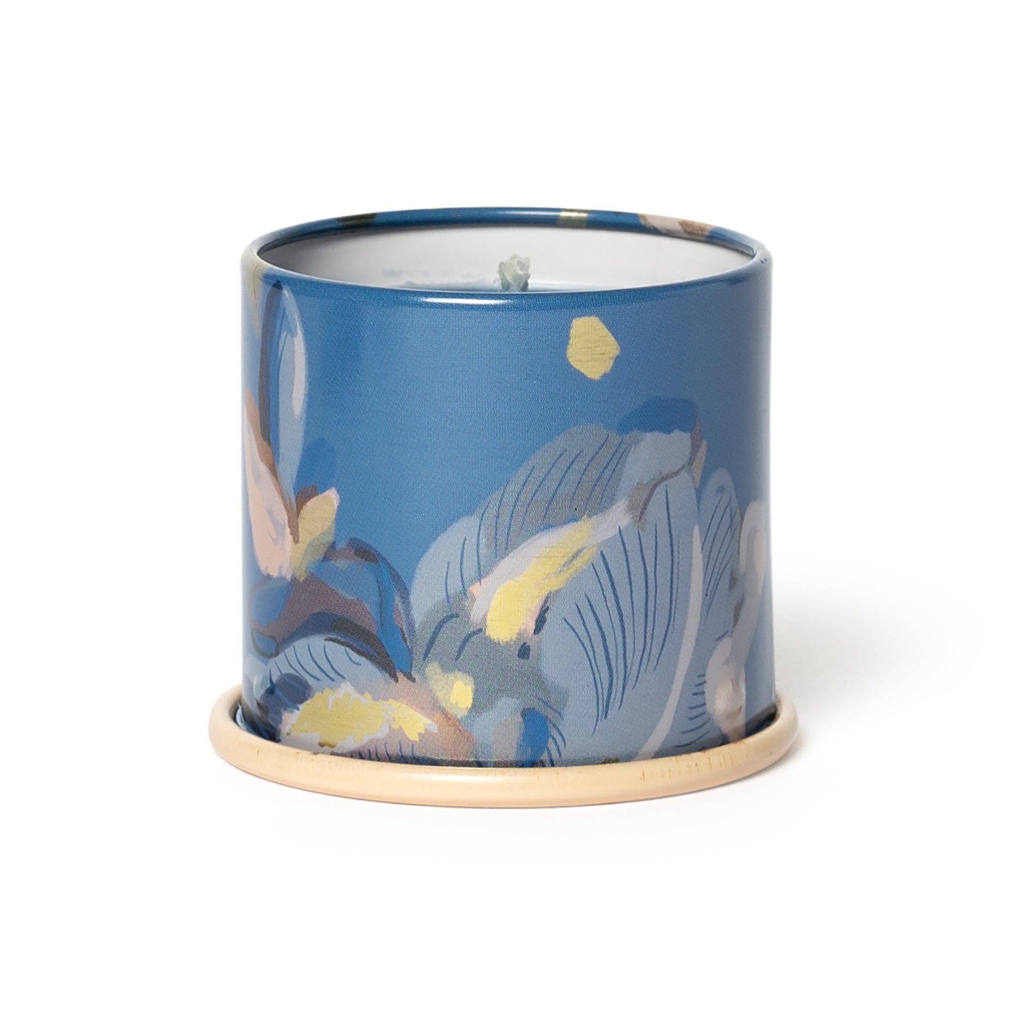 Sidevisning af Citrus Crush duftlys tin med botanisk mønster i blå og hvide toner