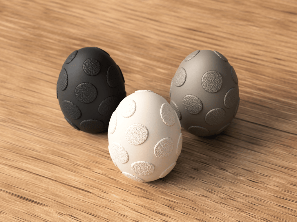 etaljebillede af grå fuzzy påskeæg med prikket mønster og blød finish