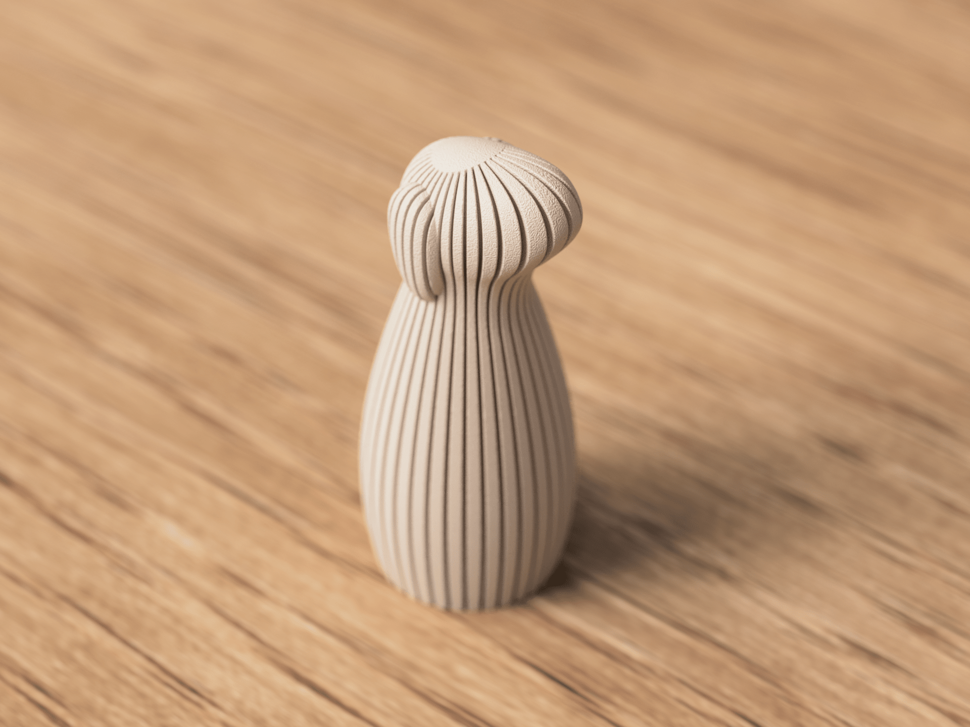 Tre hund skulpturer med hængeører i forskellig størrelse opstillet sammen – nordisk boligindretning