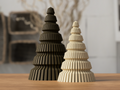 Moderne stående juletræer i japandi-design i sort og ben hvid med lagdelt ribbet silhuet – minimalistisk bordpynt fra Homae