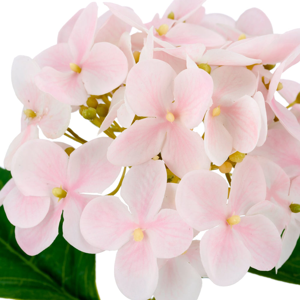 Nærbillede af kunstig hortensia i lys rosa med naturtro blomsterblade