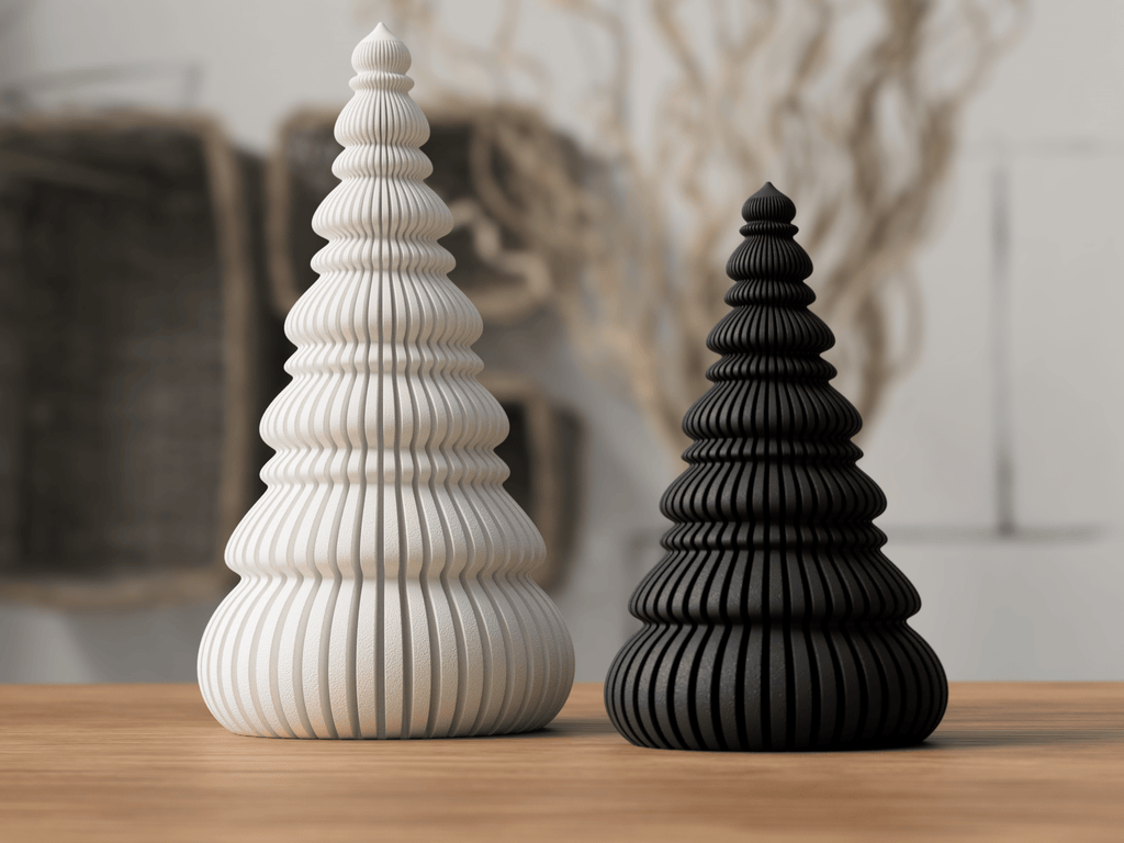 Nordiske juletræer i bone white og sort med organisk spiralformet silhuet – minimalistisk bordpynt fra Homae
