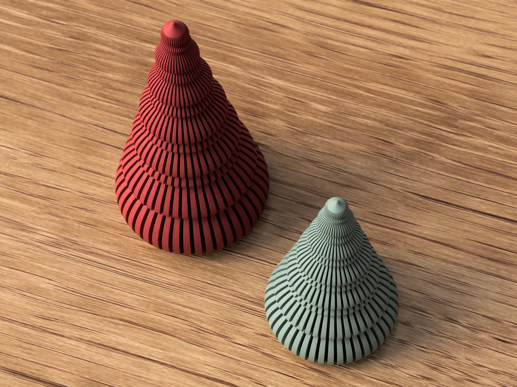 Nordiske juletræer i mørk rød og muted green med organisk spiralformet silhuet – minimalistisk bordpynt fra Homae