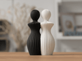 Detalje af par-statuer med to kvinder i ribbet og glat tekstur - minimalistisk PLA skulptur til hjemmet