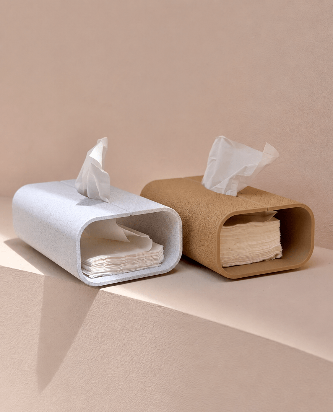 Servi Dispenser servietholder vist i to farver