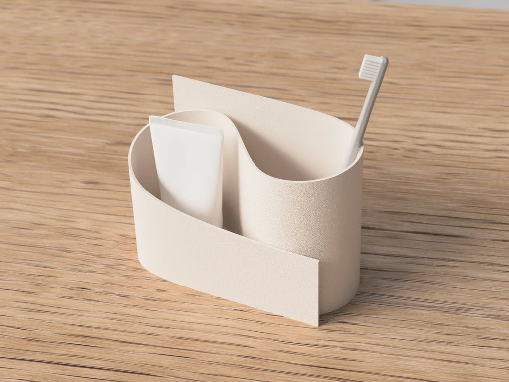 Wave opbevaringsholder i beige mat set fra siden – stilren tandbørsteholder i moderne dansk design