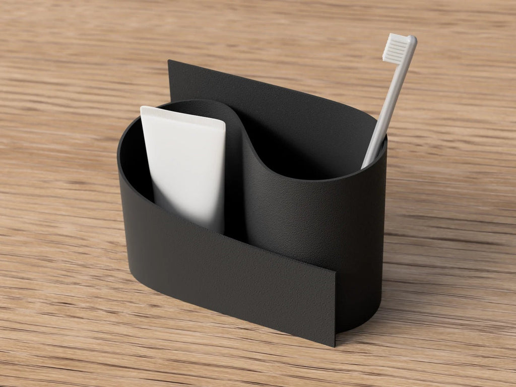 Wave opbevaringsholder i sort mat set fra siden – stilren tandbørsteholder i moderne dansk design