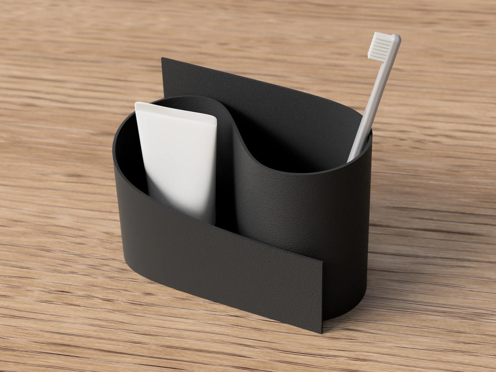 Wave opbevaringsholder i sort mat set fra siden – stilren tandbørsteholder i moderne dansk design