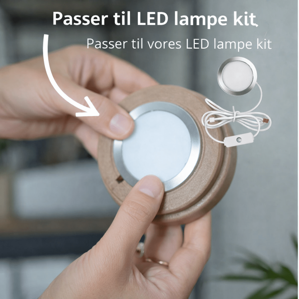 Nærbillede af Wavia bordlampens bund med LED-puck – viser kompatibilitet med standard LED lampesæt